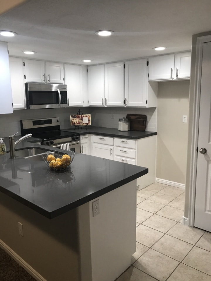 South Salt Lake, UT - Back in June we purchased this condo in South Salt Lake. The seller was in foreclosure and needed to sell it fast. We were able to put thousands of dollars in the sellers pocket and save the home from foreclosure. After replacing countertops and doing some other minor repairs we will put this condo on the market tomorrow.