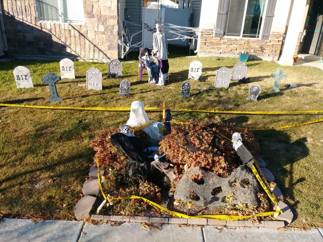 North Salt Lake, UT - I am continuing today with picking up window air conditioners and winterizing swamp coolers as best as I can catch you in the last few residents at home. I just had a really neat surprise up on somersby we're one of our more festive residence had a great display for Halloween out in the front yard.